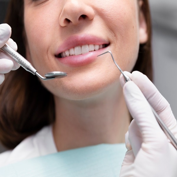close-up-smiley-patient-appointment_23-2149164306